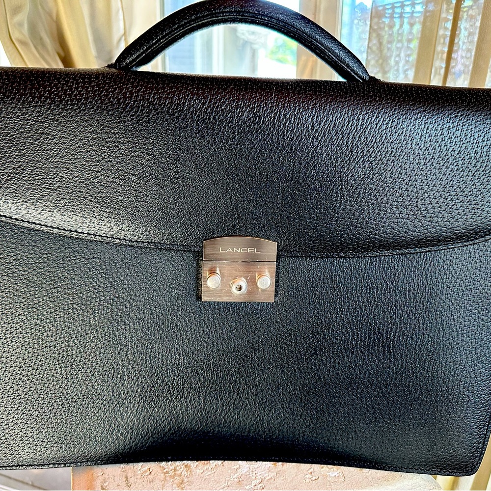 Lancel leather briefcase NWOT. Pristine condition. No strap. 11”x 15”